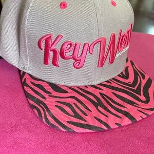Baseball hat. Pink and gray With animal print